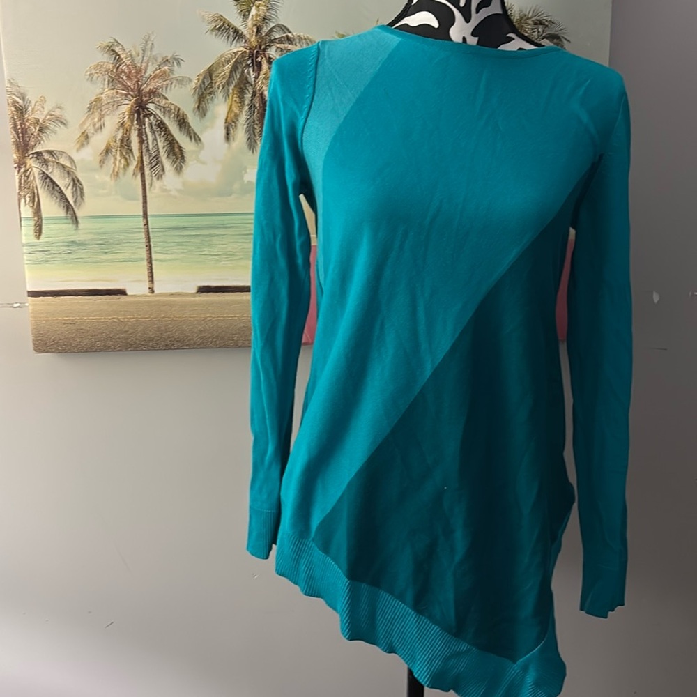 Ricki’s asymmetrical long sweater